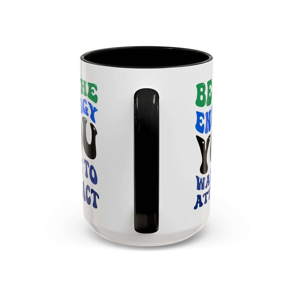 Be the Energy You Want to Attract Mug with colorful typography and black interior, perfect for daily inspiration.
