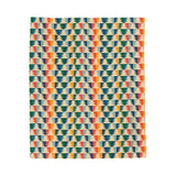 Apres Evergreen in the PNW Retro Lightweight Cozy Blanket featuring vibrant retro patterns and colors.