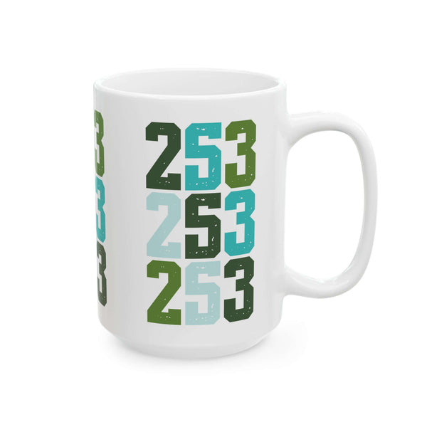Two-Five-Three Pop Tacoma ceramic mug with vibrant stacked area code design in greens and blues.