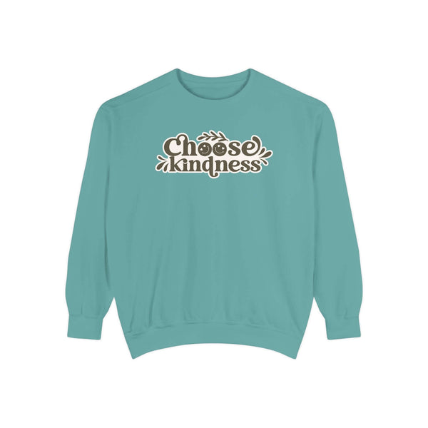 A cozy Choose Kindness sweatshirt in teal color with vintage-inspired typography.