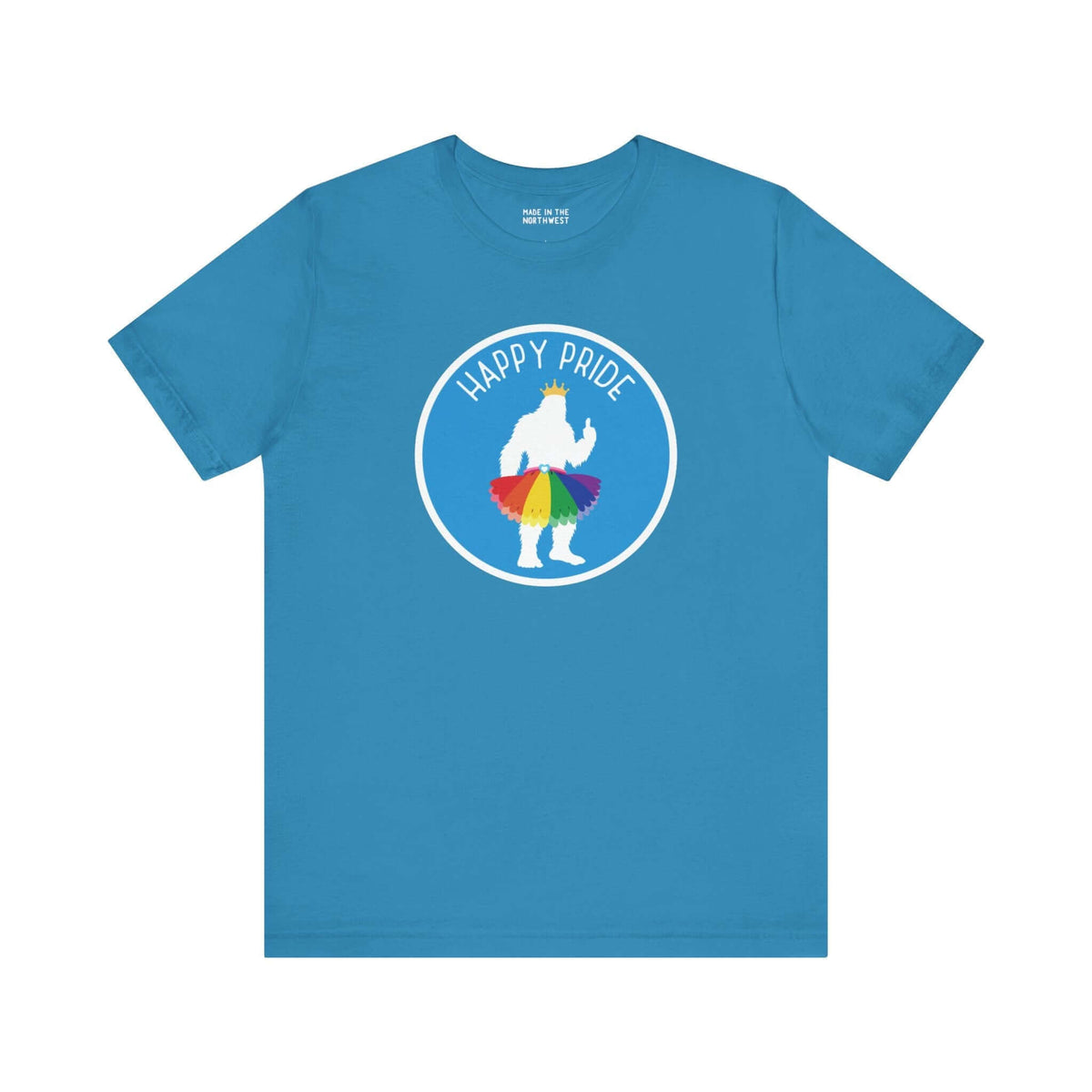 Blue tee with a silhouette of Bigfoot in a rainbow tutu and crown, encircled with "Happy Pride". Perfect for Pride celebrations.