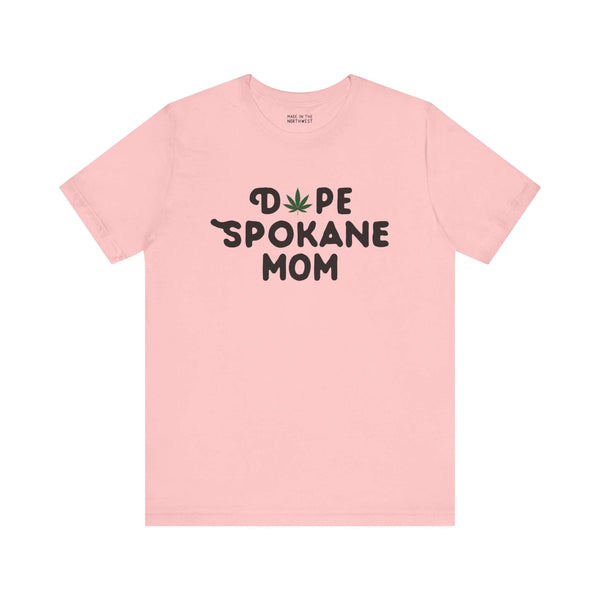 "Dope Spokane Mom soft pink tee with marijuana leaf design, celebrating Spokane's unique style and local vibe."