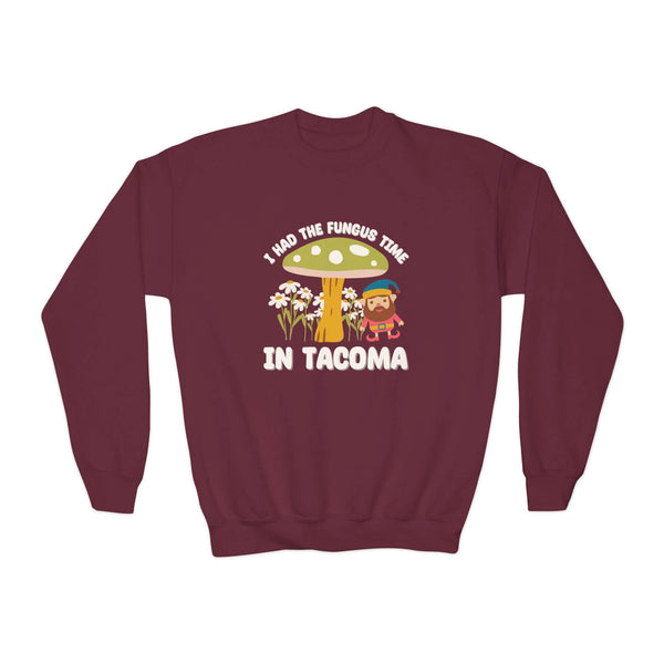 Maroon kids sweatshirt featuring 'I Had the Fungus Time in Tacoma' with a mushroom house and gnome design.