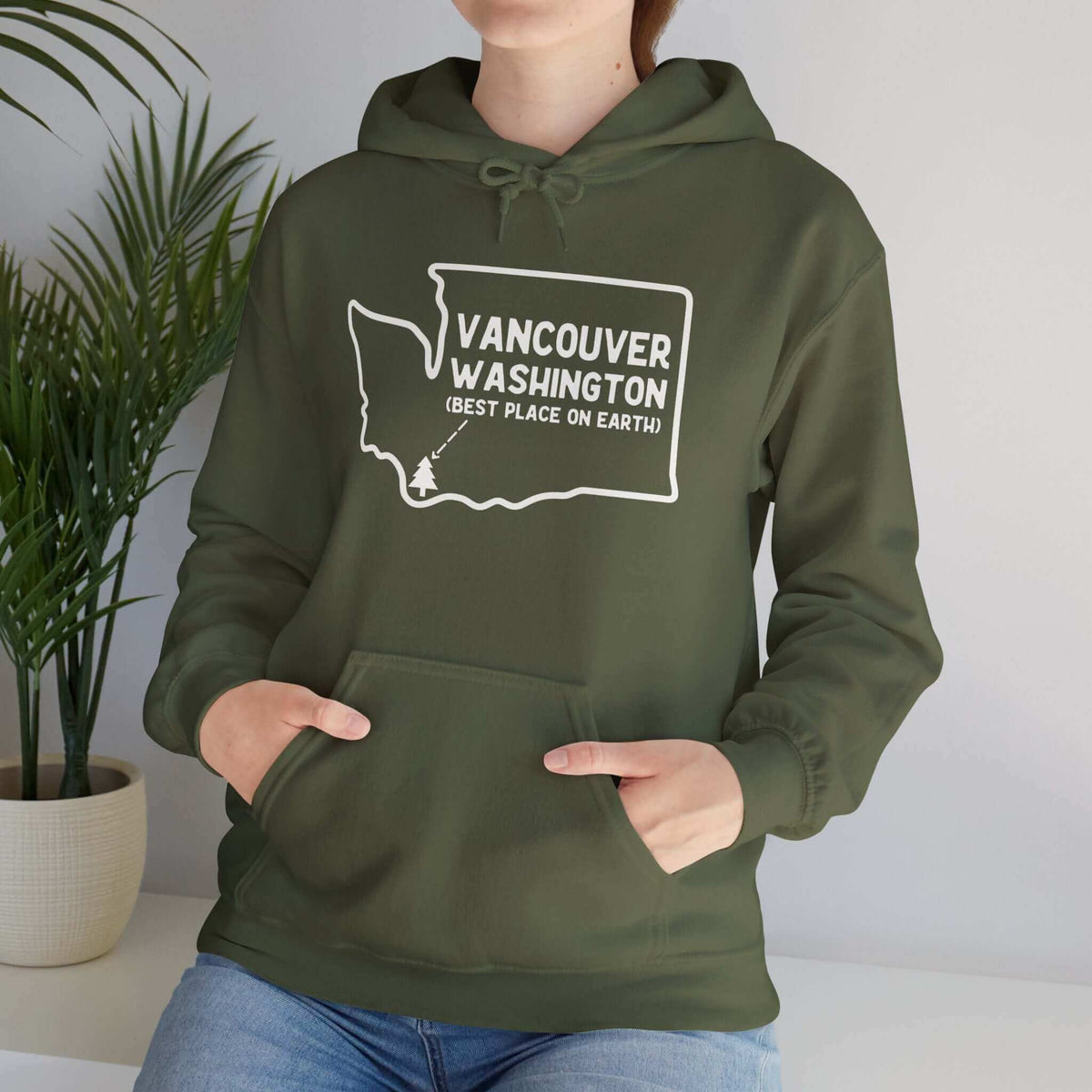 Woman wearing Vancouver Washington hoodie showcasing state graphic design indoors.