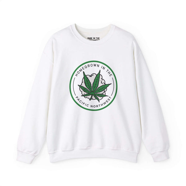 White sweatshirt with "Homegrown in the Pacific Northwest" text, featuring a marijuana leaf graphic for PNW enthusiasts.