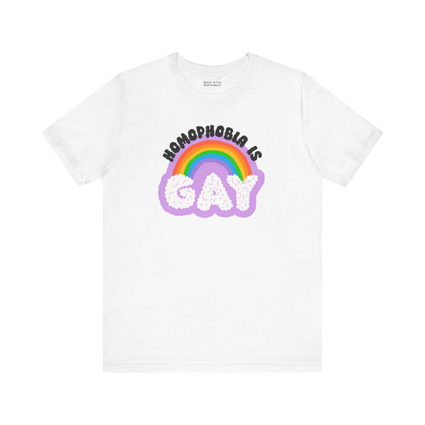 Homophobia Is Gay T shirt featuring bold rainbow design and playful typography on a white tee.