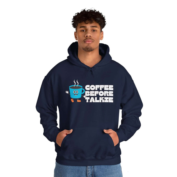 "Man wearing navy Coffee Before Talkie hoodie with coffee cup graphic"