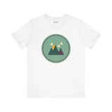 Minimalist forest tee with a Northwest style, featuring a simple mountain and forest silhouette in green, perfect for nature lovers.