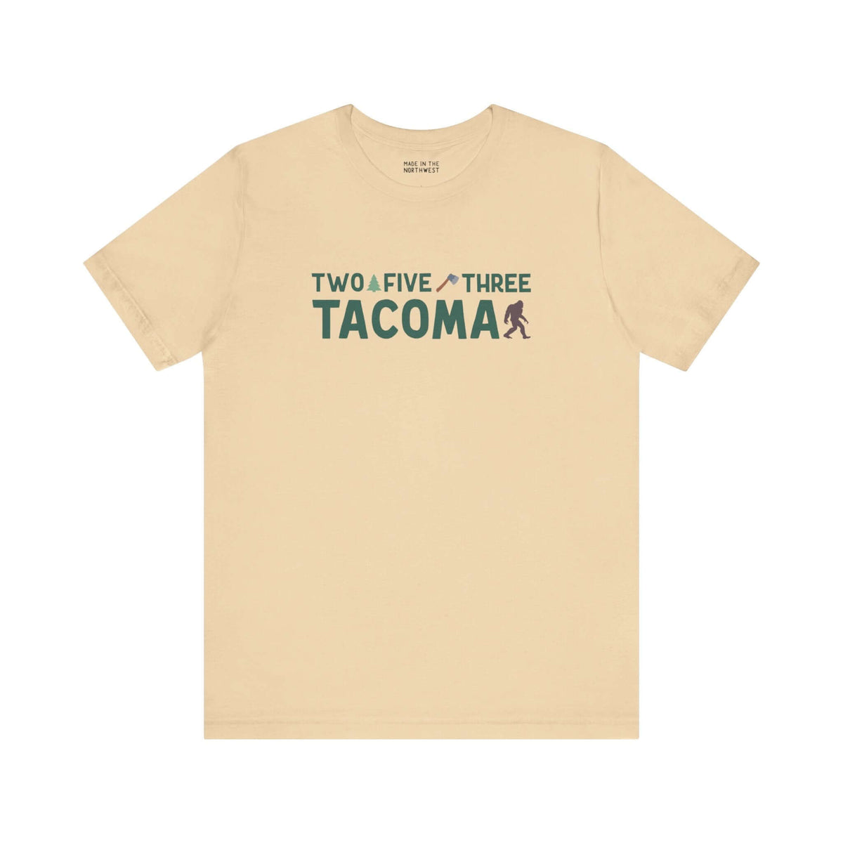 Beige "Two Five Three Tacoma" tee with axe and tree design, celebrating Tacoma pride and style.