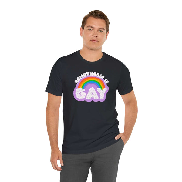 Homophobia Is Gay T Shirt – Bold Rainbow Pride Tee worn by a model, featuring rainbow graphics and playful typography.