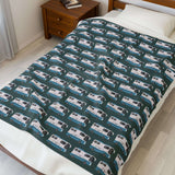 Highway Hideaway Class A Motorhome Lightweight Cozy Blanket featuring a pattern of motorhomes on a bed.