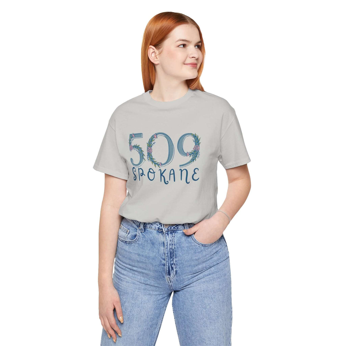 Woman wearing 509 Floral Area Code tee showing Pacific Northwest pride in Spokane-themed soft t-shirt.