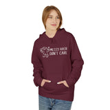Woman wearing a Messy Hair Don't Care Hoodie featuring a playful Sasquatch design.