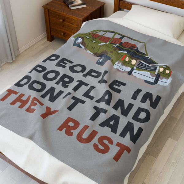 People in Portland Don't Tan They Rust Lightweight Cozy Blanket showcasing a vintage car on a cozy bed.