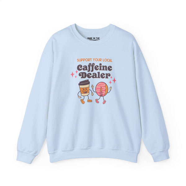 Light blue sweatshirt with 'Support Your Local Caffeine Dealer' graphic featuring coffee cup and donut characters.