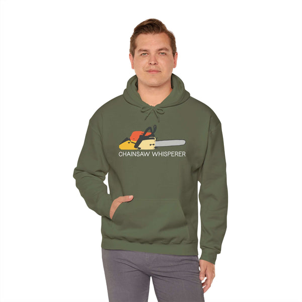 Man wearing a Chainsaw Whisperer Hoodie featuring a chainsaw graphic.