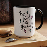 Be Kind to Yourself Mug featuring cheerful hand-lettered design with hearts on a glossy white ceramic surface.