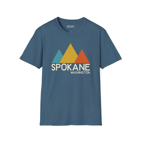 Modern Peaks Spokane T Shirt featuring a colorful mountain design and Spokane text on a blue background.