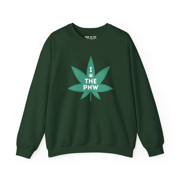 Green PNW sweatshirt with a marijuana leaf graphic and "I The PNW" text, celebrating Pacific Northwest's nature-loving spirit.