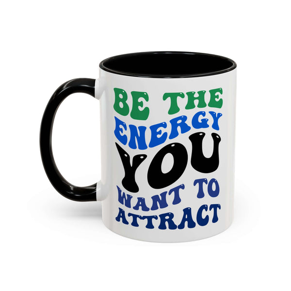 Be the Energy You Want to Attract Mug with bold typography and black interior, perfect for daily inspiration.