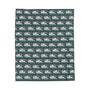 Motorhome blanket featuring a repeating pattern of Class A motorhomes on a cozy throw design.