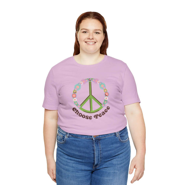 Premium soft tee featuring green peace sign and colorful flowers with 'Choose Peace' text, promoting positivity and good vibes.