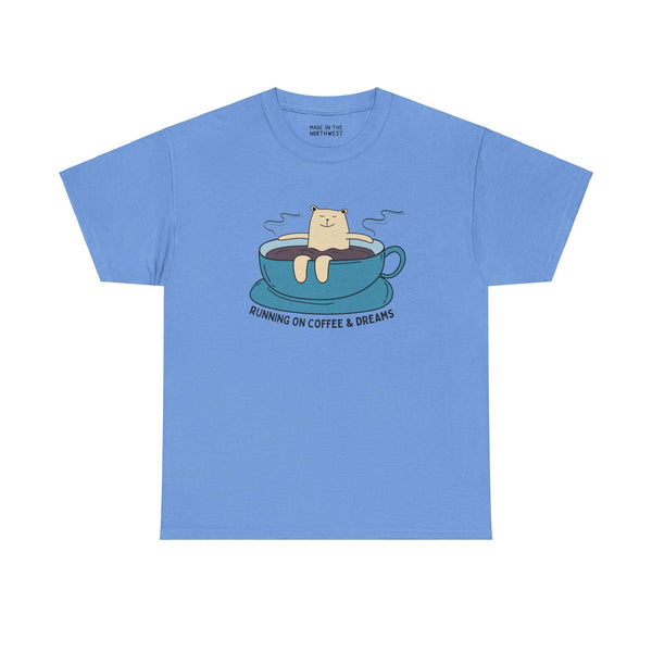 Blue athletic tee featuring a bear lounging in a coffee cup with "Running on Coffee and Dreams" text, perfect for coffee lovers.