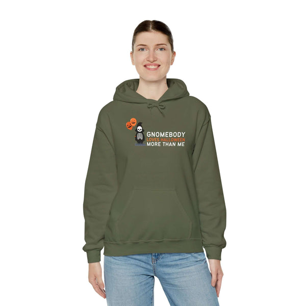Gnomebody Loves Halloween More Than Me hoodie worn by a woman, featuring a skeleton gnome and Halloween balloons.