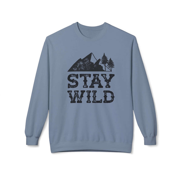 Stay Wild sweatshirt featuring a vintage mountain and trees graphic on a cozy blue crewneck.