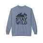 Stay Wild sweatshirt featuring a vintage mountain and trees graphic on a cozy blue crewneck.