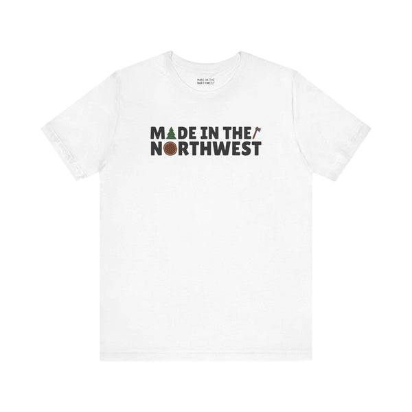 White Northwest Woodlands soft tee with tree, log, and axe design, "Made in the Northwest" text; perfect for nature lovers.