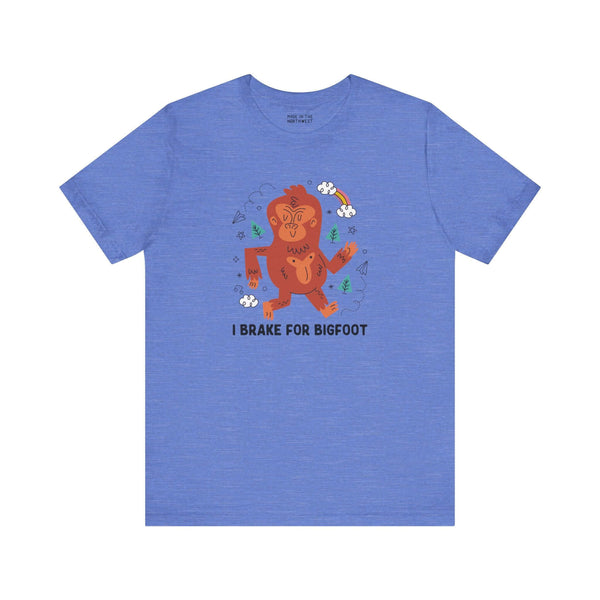 I Brake for Bigfoot Soft Tee Show your playful side and love for local folklore with our "I Brake for Bigfoot" Sasquatch Tee. This fun design features the phrase "I Brake for Bigfoot" alongside a whimsical graphic of a Sasquatch, perfect for those who enj