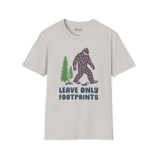 Leave Only Footprints T Shirt featuring a Sasquatch and evergreen trees on a light background.