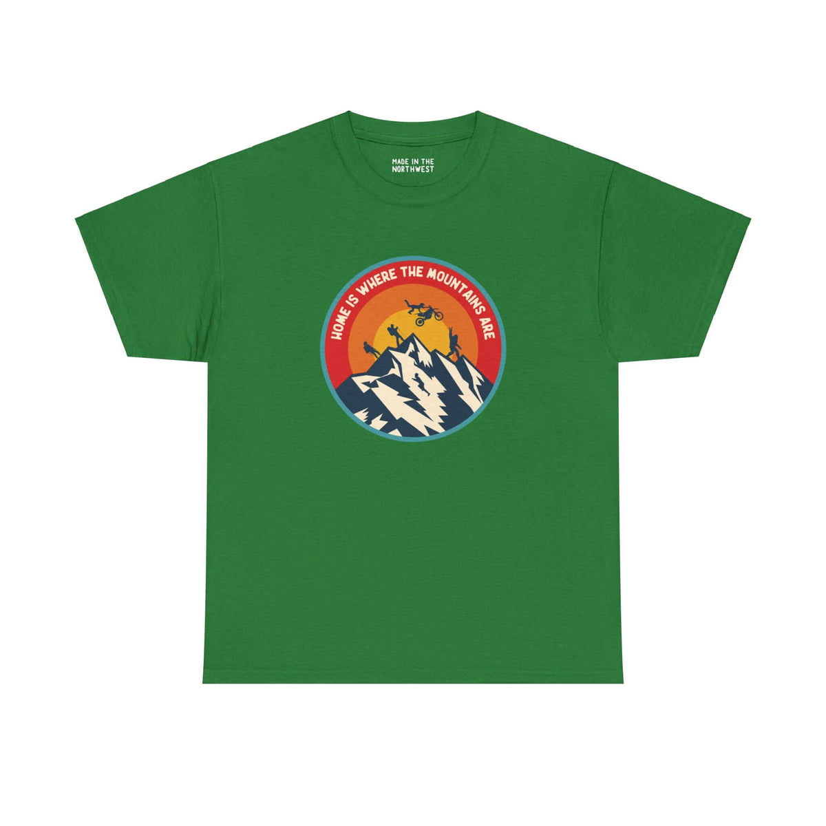 Green athletic tee with "Home is Where the Mountains Are" design, featuring PNW activities and Bigfoot in a colorful circle.