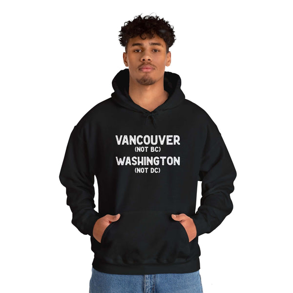 Black hoodie with text 'Vancouver (NOT BC) Washington (NOT DC)' for proud locals in Vancouver, Washington.