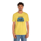 Model wearing a yellow tee featuring a BMW E30 325is and text: A Driving Machine for the Sensible Fanatic.
