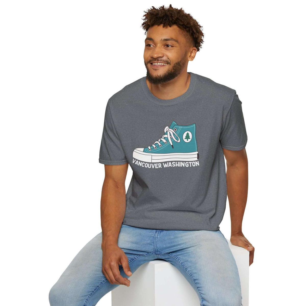 Kickin’ It in the 360 Vancouver T Shirt on a smiling man with Converse graphic design.