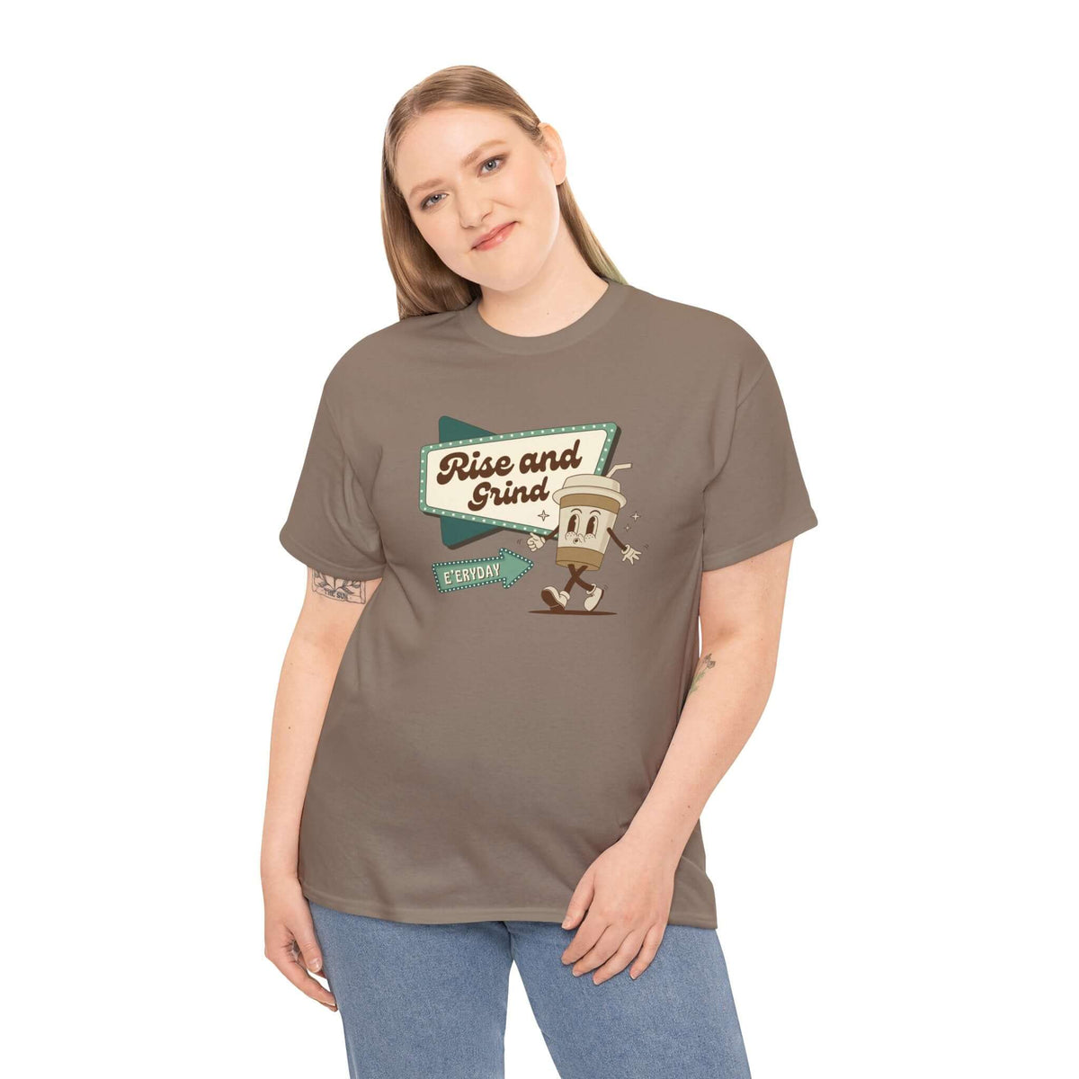 Woman wearing a Rise and Grind E'eryday Coffee Athletic Tee, showcasing a playful coffee graphic.