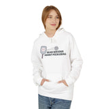 Woman wearing Dead Serious About Pickleball Hoodie with a skull-decorated paddle graphic.