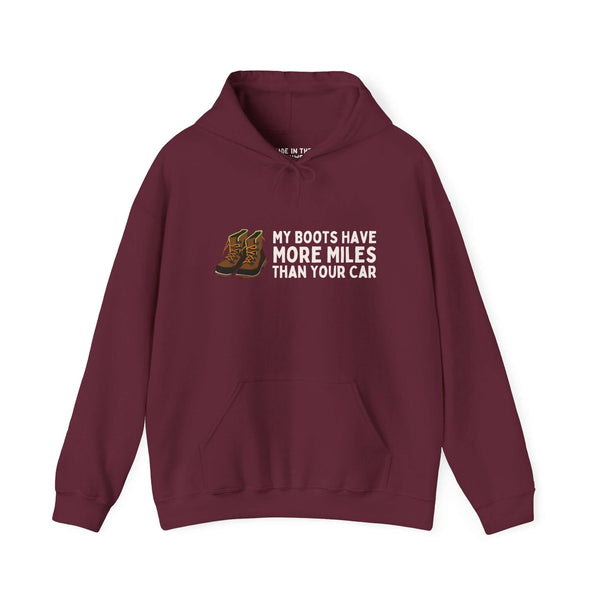 Maroon unisex hoodie with 'My Boots Have More Miles Than Your Car' design, ideal for hikers and outdoor enthusiasts.