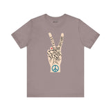Power in Peace Premium Soft Tee featuring a peace sign with uplifting words like faith, love, and unity.