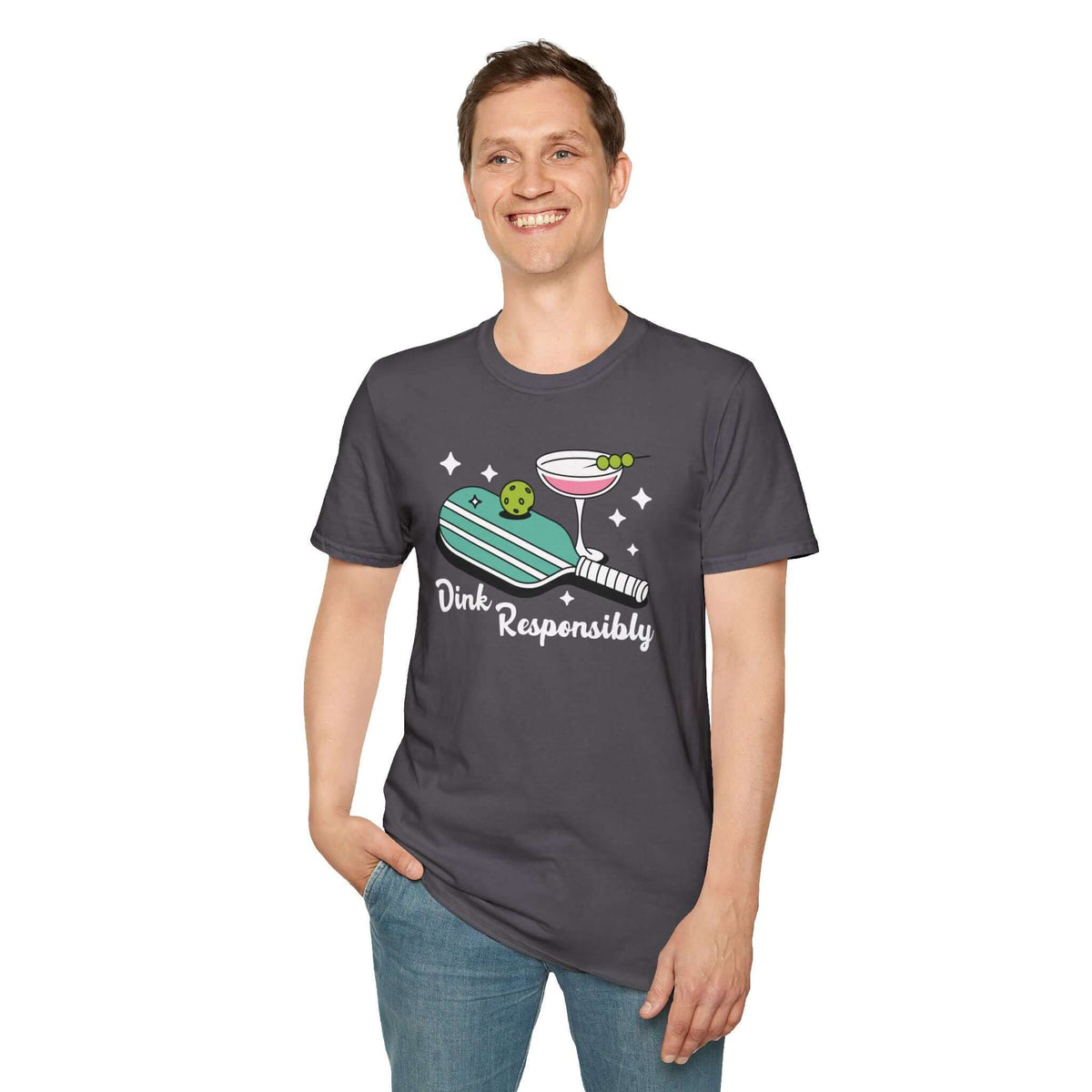 Dink responsibly t shirt featuring a pickleball paddle and cocktail design worn by a smiling man.
