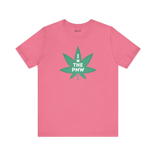 Pink tee with a green marijuana leaf and "I (Weed) the PNW" text, celebrating Pacific Northwest vibes.