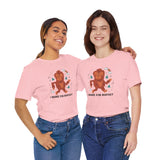 Two women wearing pink I Brake for Bigfoot tees featuring a fun Sasquatch graphic, perfect for folklore lovers.