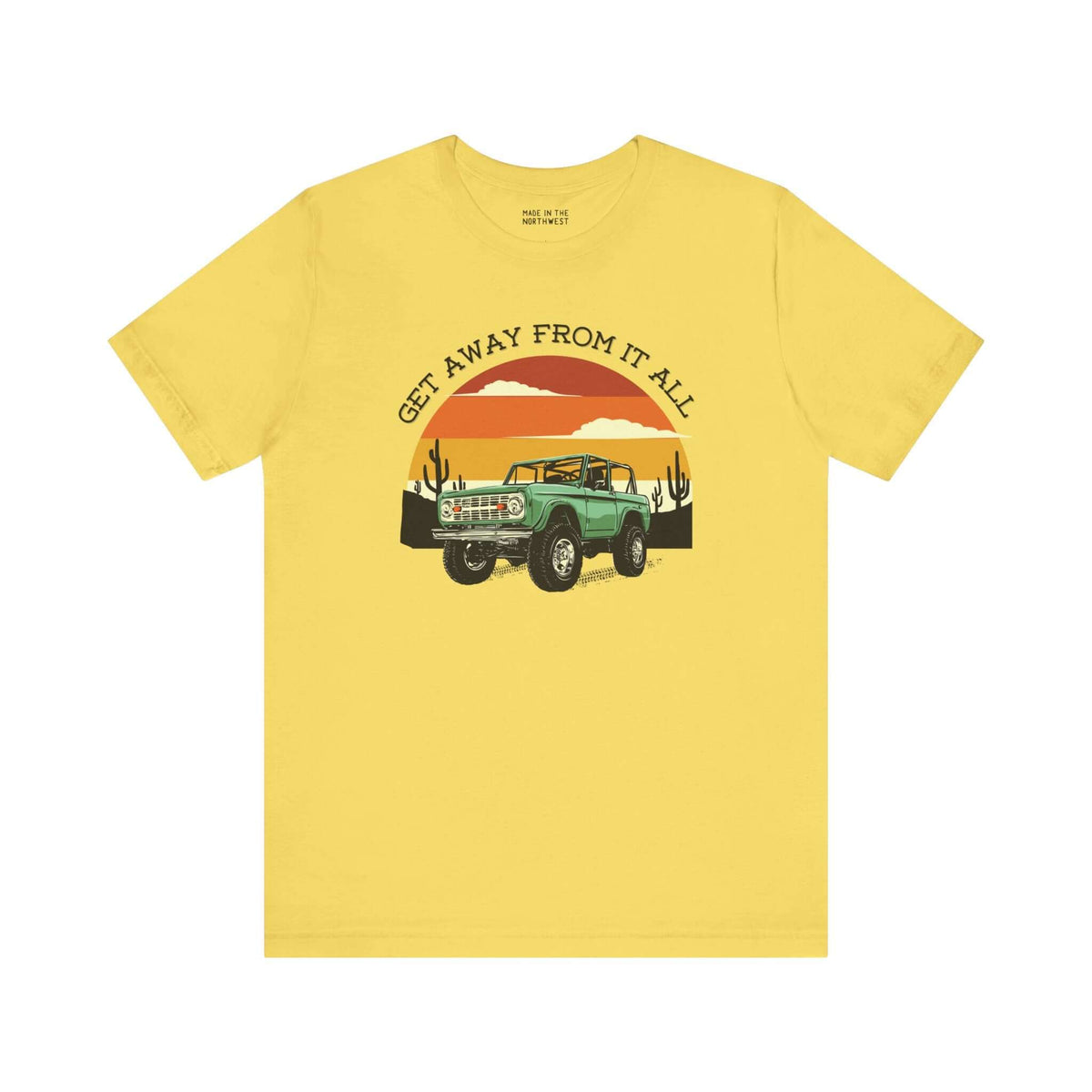 Vintage Bronco graphic tee in yellow, featuring retro adventure vibes and sunset design.