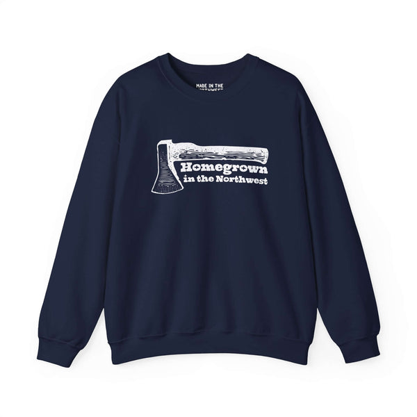 "Navy sweatshirt with 'Homegrown in the Northwest' and axe design, celebrating Pacific Northwest spirit and resilience."