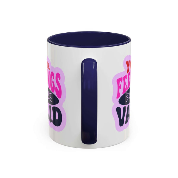 Your Feelings Are Valid Mug with navy interior and handle, featuring a supportive phrase on a glossy white exterior.