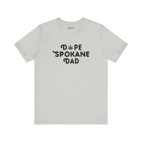 Dope Spokane Dad Premium Soft Tee featuring a marijuana leaf as the 'O', perfect for cool dads in Washington.