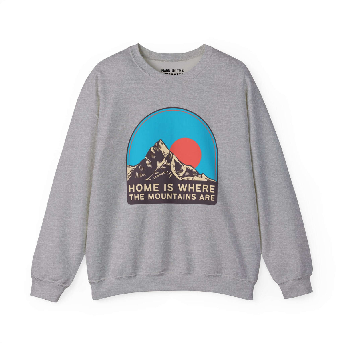 Gray sweatshirt with "Home is Where the Mountains Are" text and graphic of mountains and sky. Perfect for nature lovers and hikers.