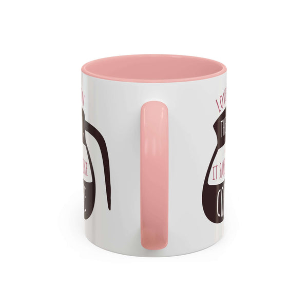 Love Smells Like Coffee Mug with playful design and pink interior, perfect for cozy coffee moments.